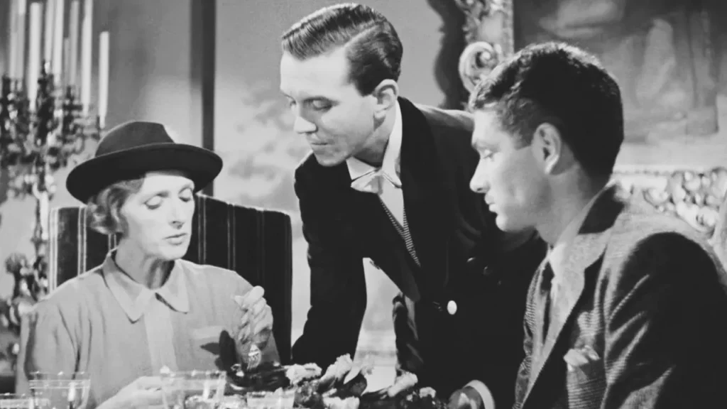 Laurence Olivier, Gladys Cooper e Philip Winter em" Rebecca, a Mulher Inesquecível" - filme de Alfred Hitchcock 